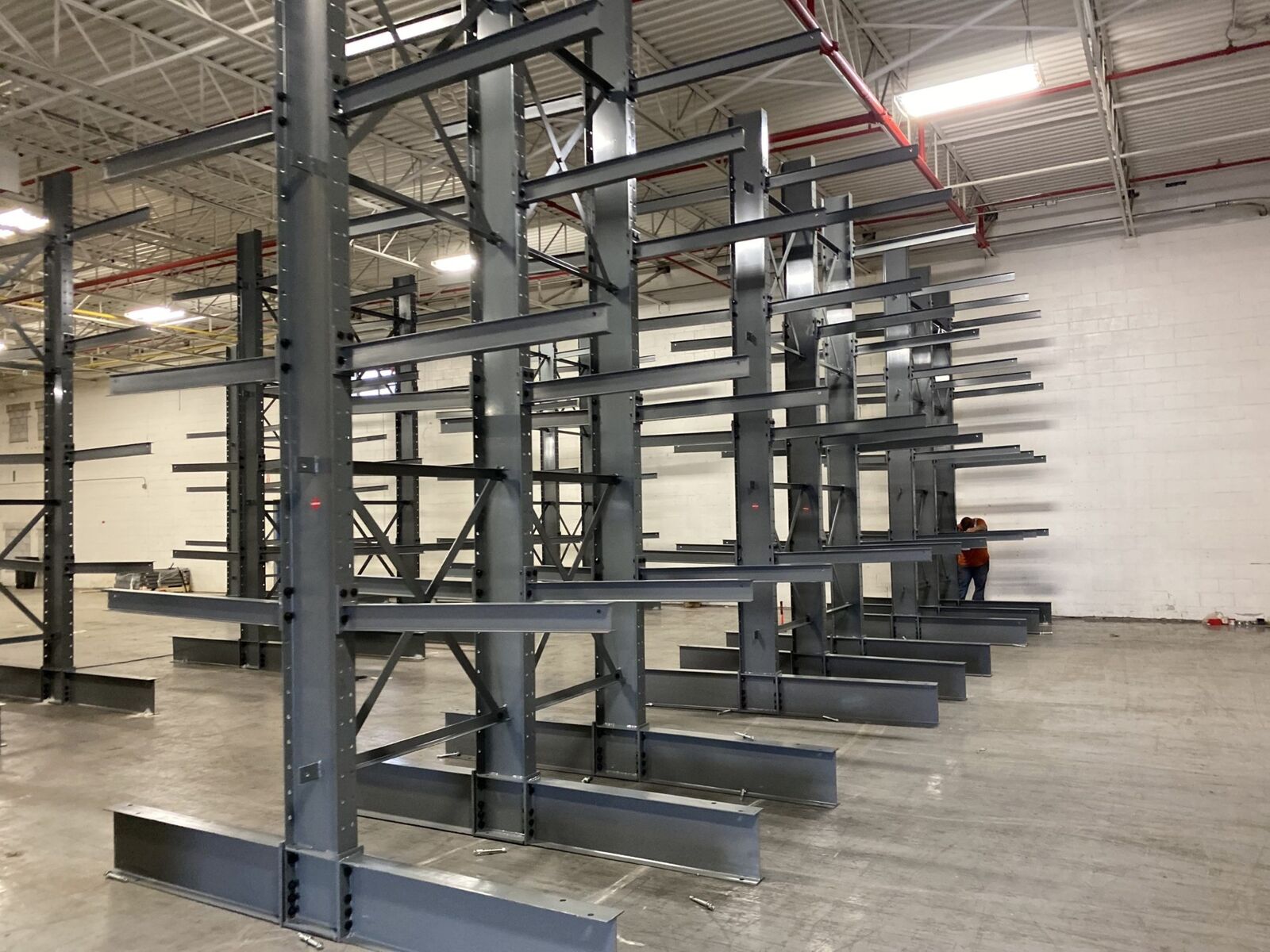 Cantilever rack arms set up inside a warehouse