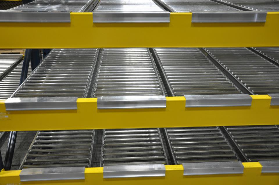 Carton flow shelving on a warehouse pick line