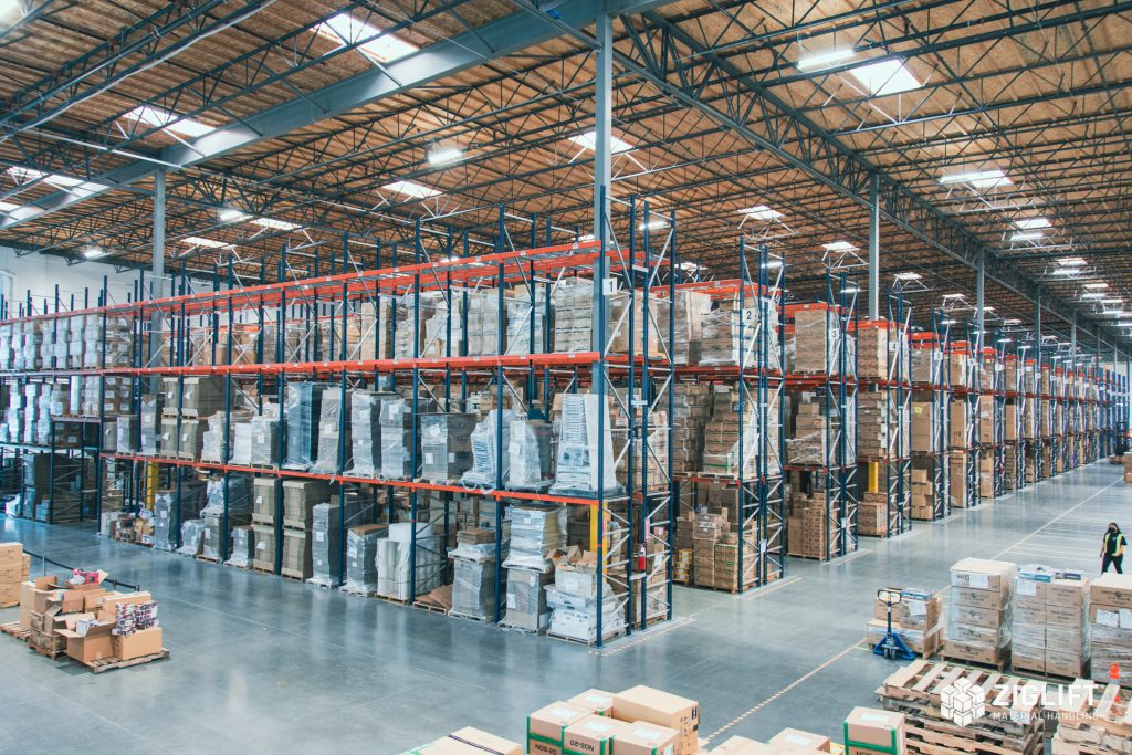 Rows of selective pallet racks loaded with pallets