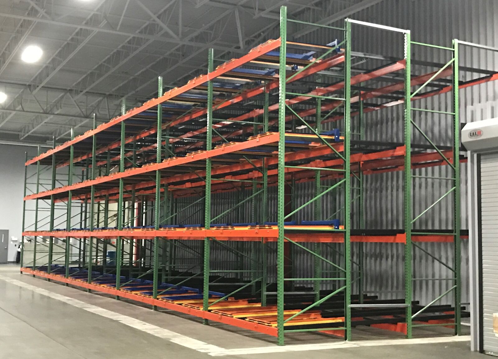 Push back pallet rack system installed in a warehouse